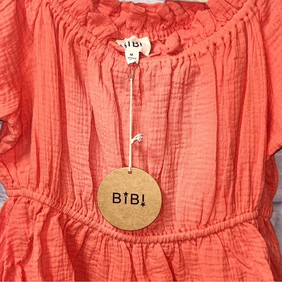 Elegant Coral Ruffled Blouse - Picture 3 of 4